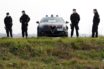 Carabinieri officers wearing face masks on patrol.