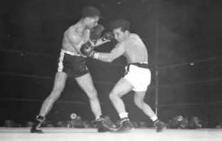 Jake LaMotta vs Billy Fox in 1947. LaMotta would go on to lose the fight on purpose in the fourth round.
