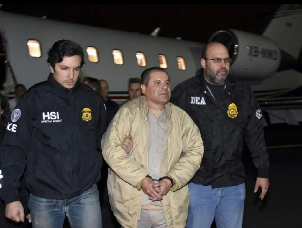 Joaquin 'El Chapo' Guzman being escorted by Federal authorities from a plane at Long Island's MacArthur Airport in 2017.