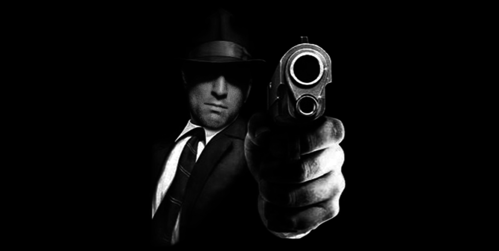 Mobster pointing a gun