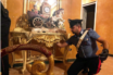 Italian Police search one of the houses seized from the Casamonica clan in an early morning raid.