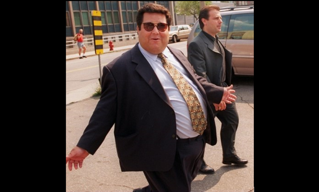 Pat Musitano leaving a Hamilton court in 1996